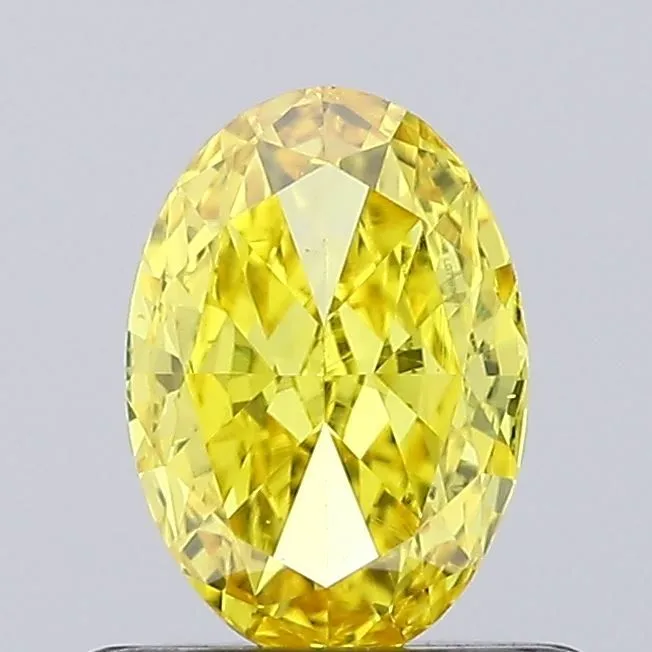 0.57ct OVAL Fancy Vivid Yellow VS1 Coloured Lab diamond