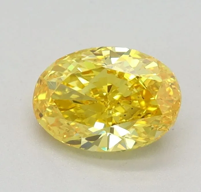 0.56ct OVAL Fancy Vivid Yellow VS1 Coloured Lab diamond