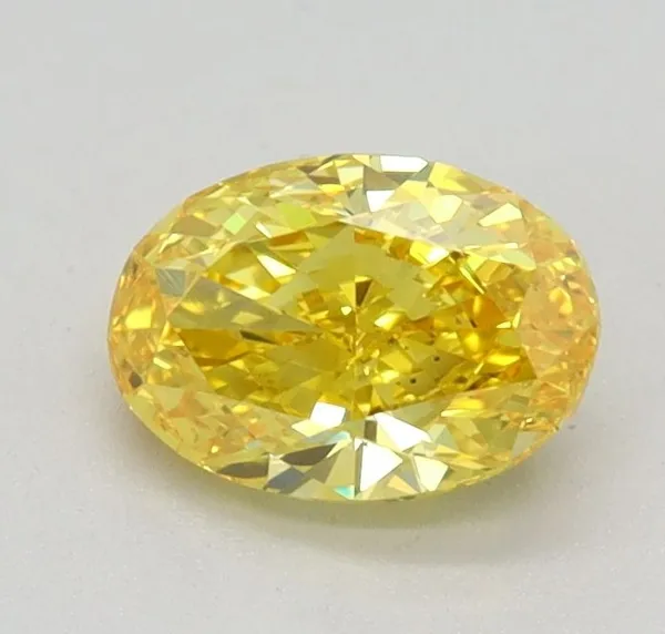 0.56ct OVAL Fancy Vivid Yellow VS1 Coloured Lab diamond