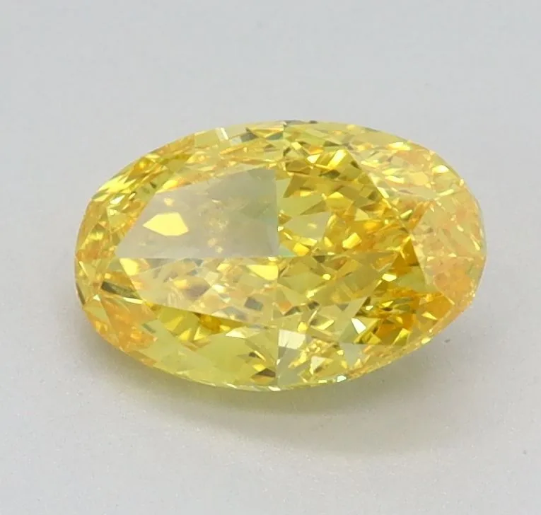 0.79ct OVAL Fancy Vivid Yellow VVS2 Coloured Lab diamond