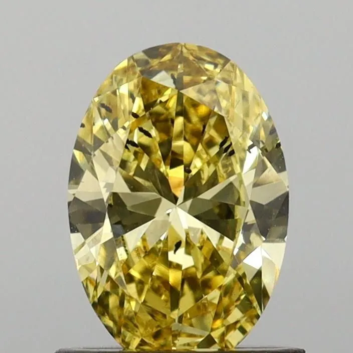0.86ct OVAL Fancy Vivid Yellow SI1 Coloured Lab diamond