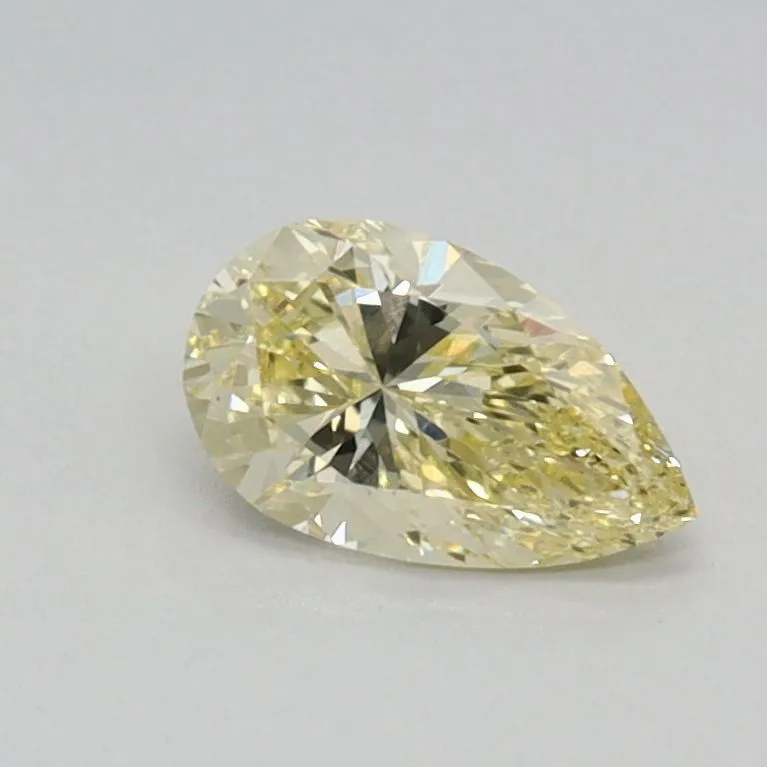 0.39ct PEAR Fancy Yellow VS1 Coloured Lab diamond