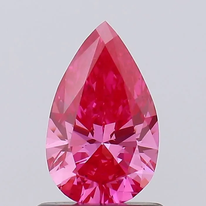 0.73ct PEAR Fancy Vivid Pink VS2 Coloured Lab diamond