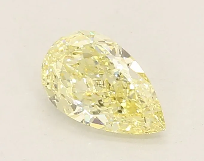 0.62ct PEAR Fancy Yellow VS1 Coloured Lab diamond