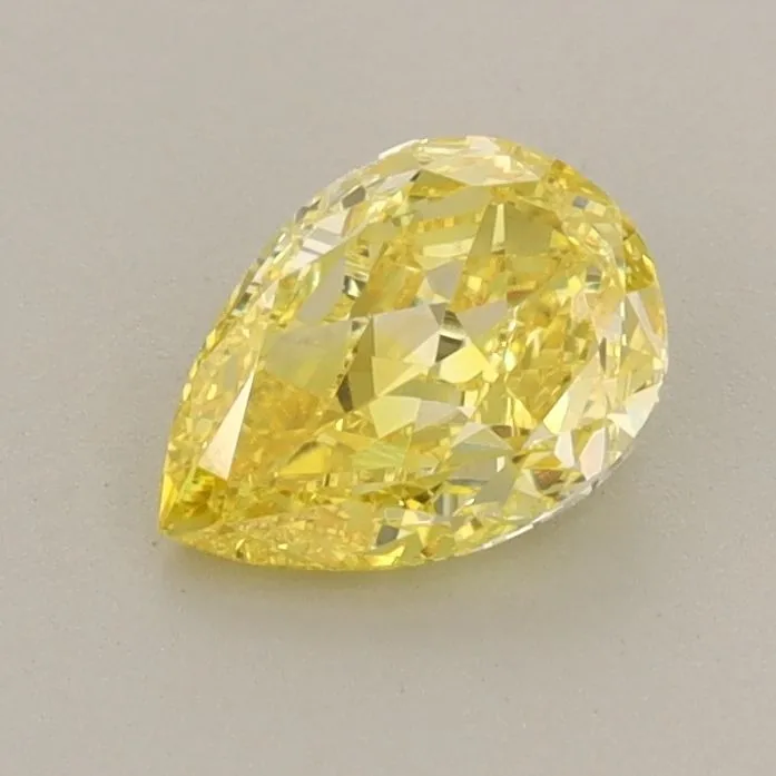 0.74ct PEAR Fancy Vivid Yellow VS1 Coloured Lab diamond
