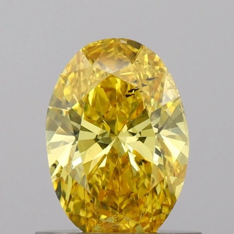 0.76ct OVAL Fancy Vivid Yellow VS2 Coloured Lab diamond
