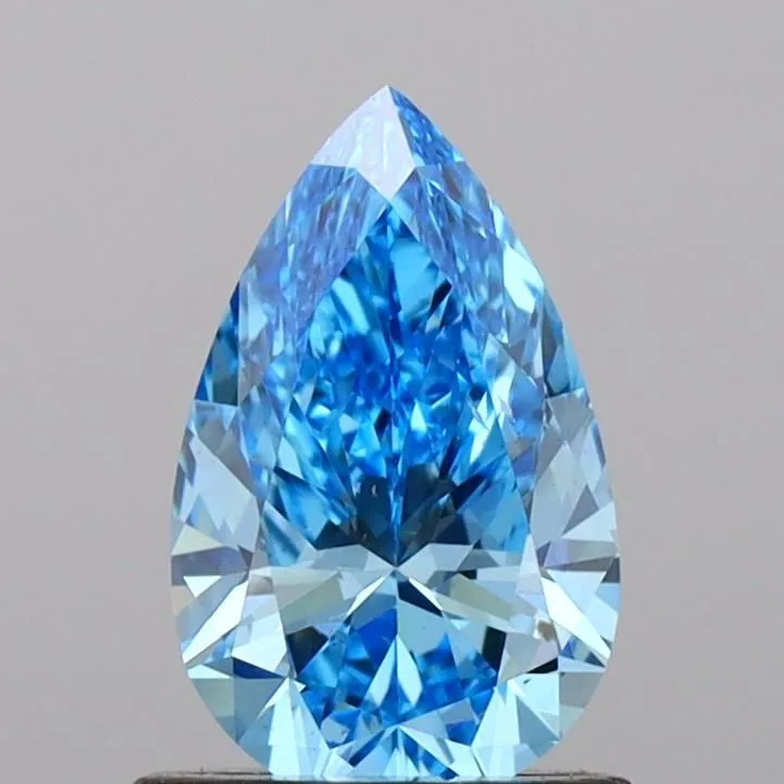 0.99ct PEAR Fancy Vivid Blue VS2 Coloured Lab diamond