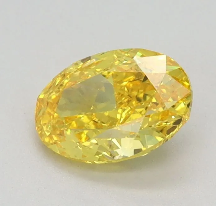 0.62ct OVAL Fancy Vivid Yellow VS1 Coloured Lab diamond