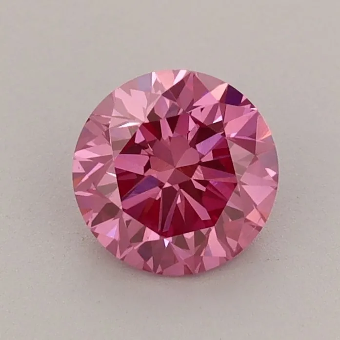 0.79ct ROUND Fancy Vivid Pink VS2 Coloured Lab diamond