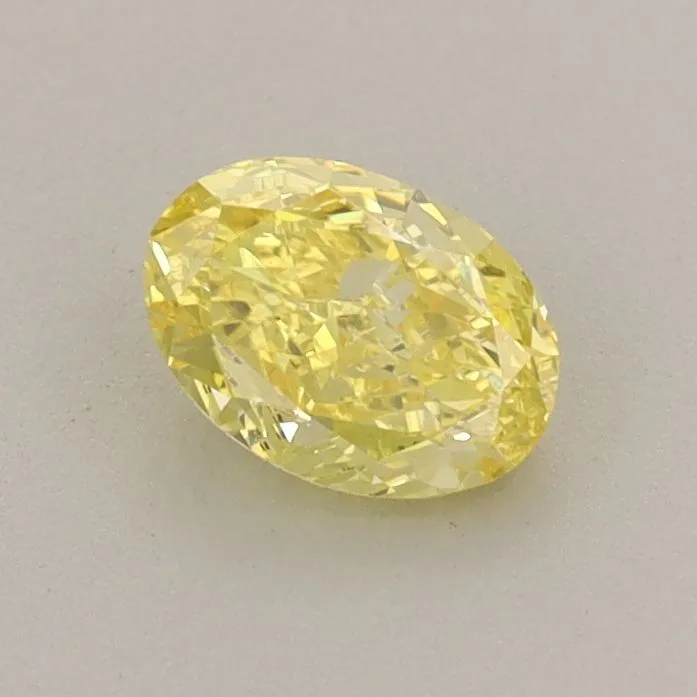 0.56ct OVAL Fancy Vivid Yellow VS1 Coloured Lab diamond