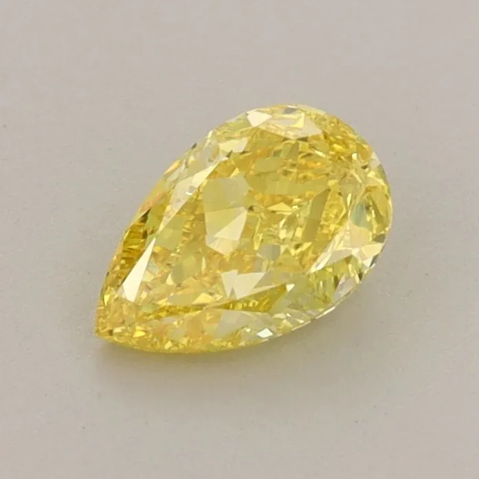 0.70ct PEAR Fancy Vivid Yellow VVS1 Coloured Lab diamond