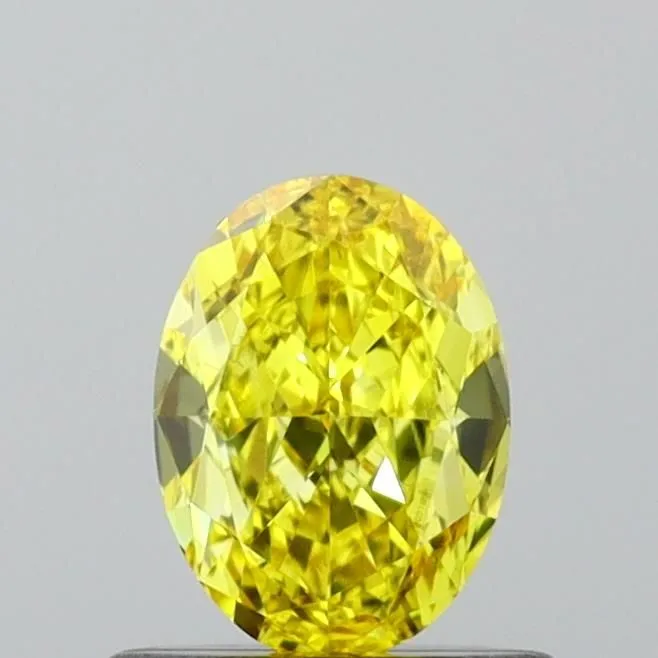 0.64ct OVAL Fancy Vivid Yellow VS2 Coloured Lab diamond