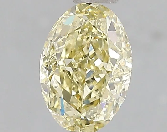 1.07ct OVAL Fancy Yellow VS2 Coloured Lab diamond