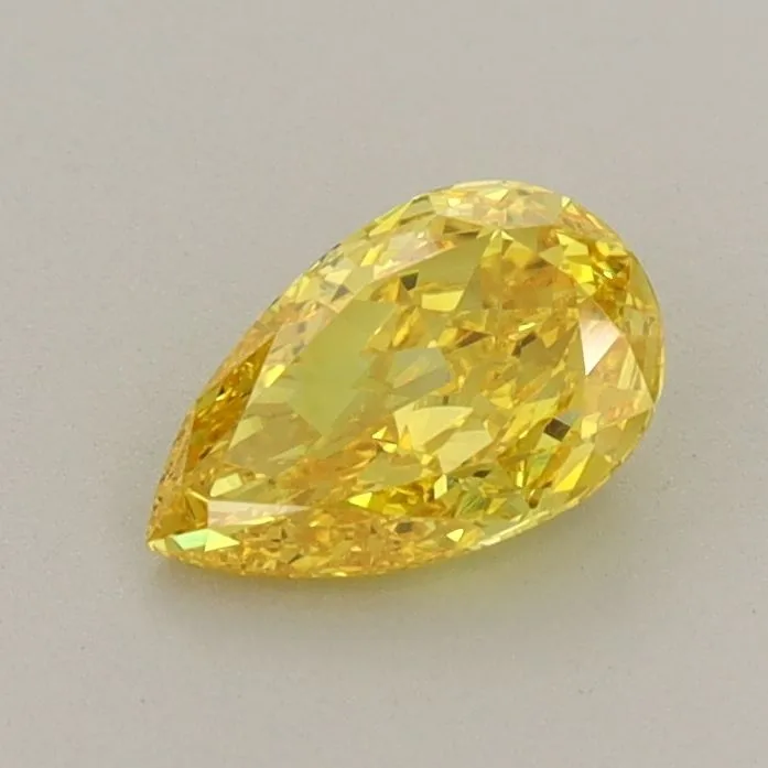 0.64ct PEAR Fancy Vivid Yellow VVS2 Coloured Lab diamond