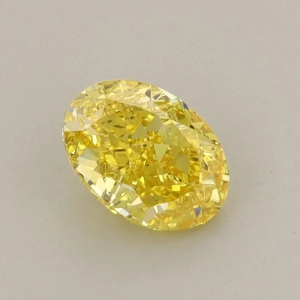 0.64ct OVAL Fancy Vivid Yellow VVS2 Coloured Lab diamond