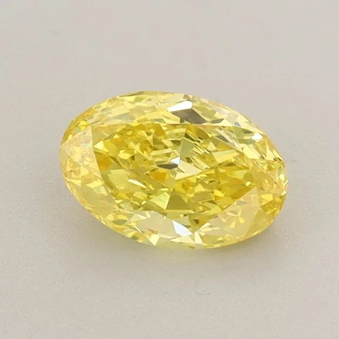 0.66ct OVAL Fancy Vivid Yellow VS1 Coloured Lab diamond