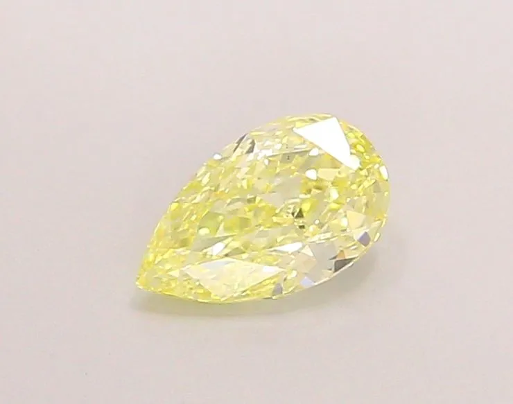 0.93ct PEAR Fancy Yellow VS2 Coloured Lab diamond