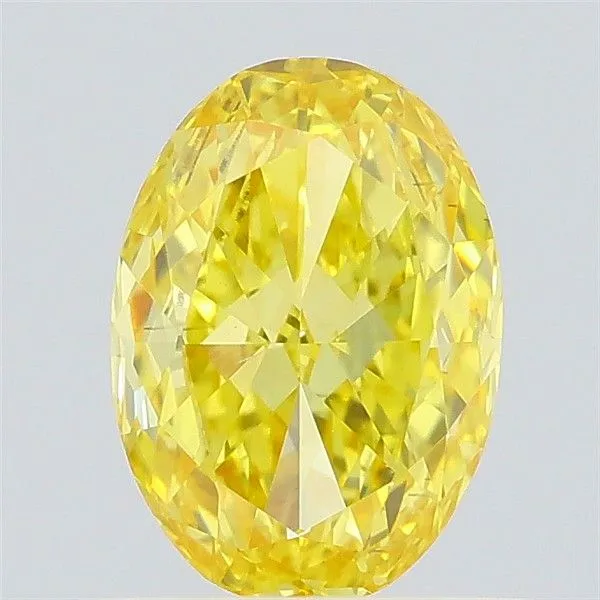 0.71ct OVAL Fancy Vivid Yellow VS2 Coloured Lab diamond
