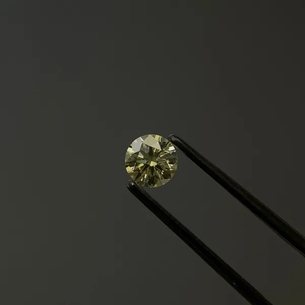 0.71ct ROUND Fancy Light Yellow VVS2 Coloured Lab diamond