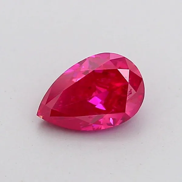 0.84ct PEAR Fancy Vivid Pink VS2 Coloured Lab diamond