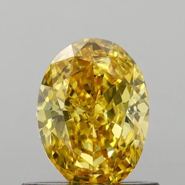 0.72ct OVAL Fancy Vivid Yellow VS2 Coloured Lab diamond