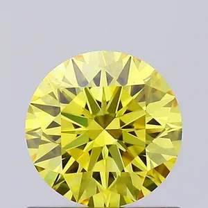 0.63ct ROUND Fancy Vivid Yellow VVS1 Coloured Lab diamond