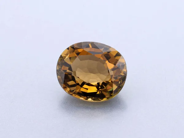 1.26ct Orange Tourmaline, Oval cut gemstone