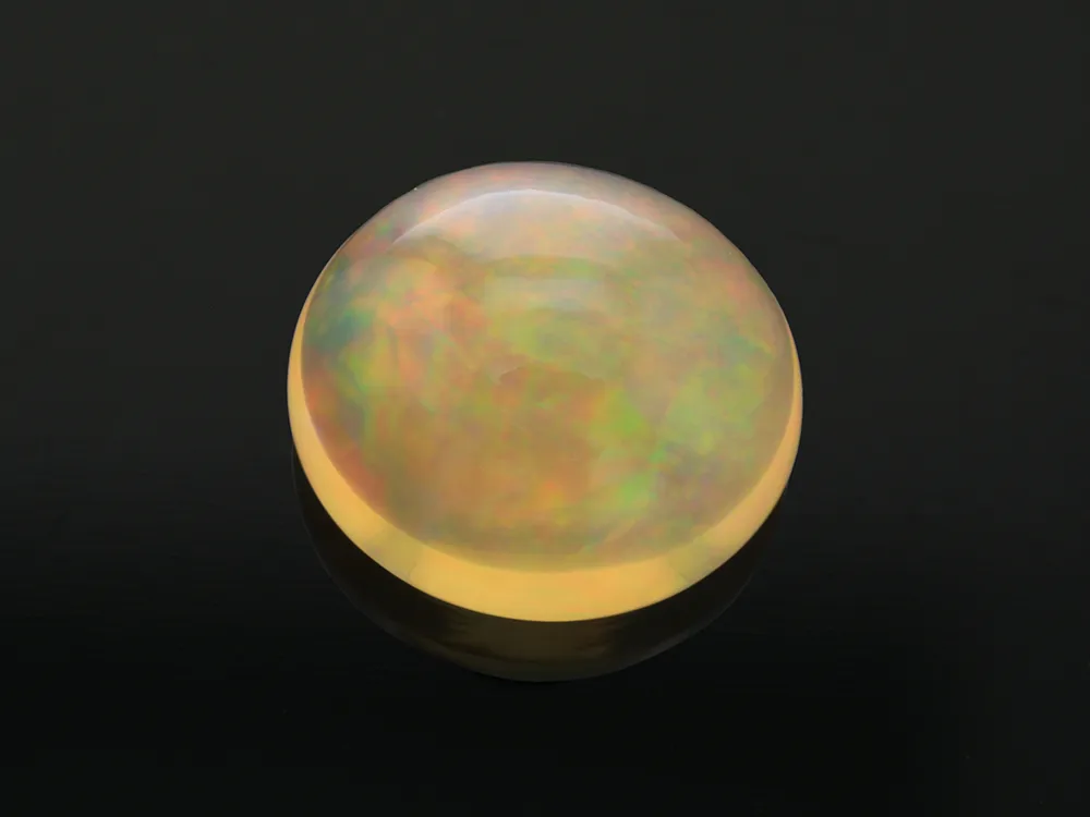6.06ct Orange Opal, Cabochon gemstone